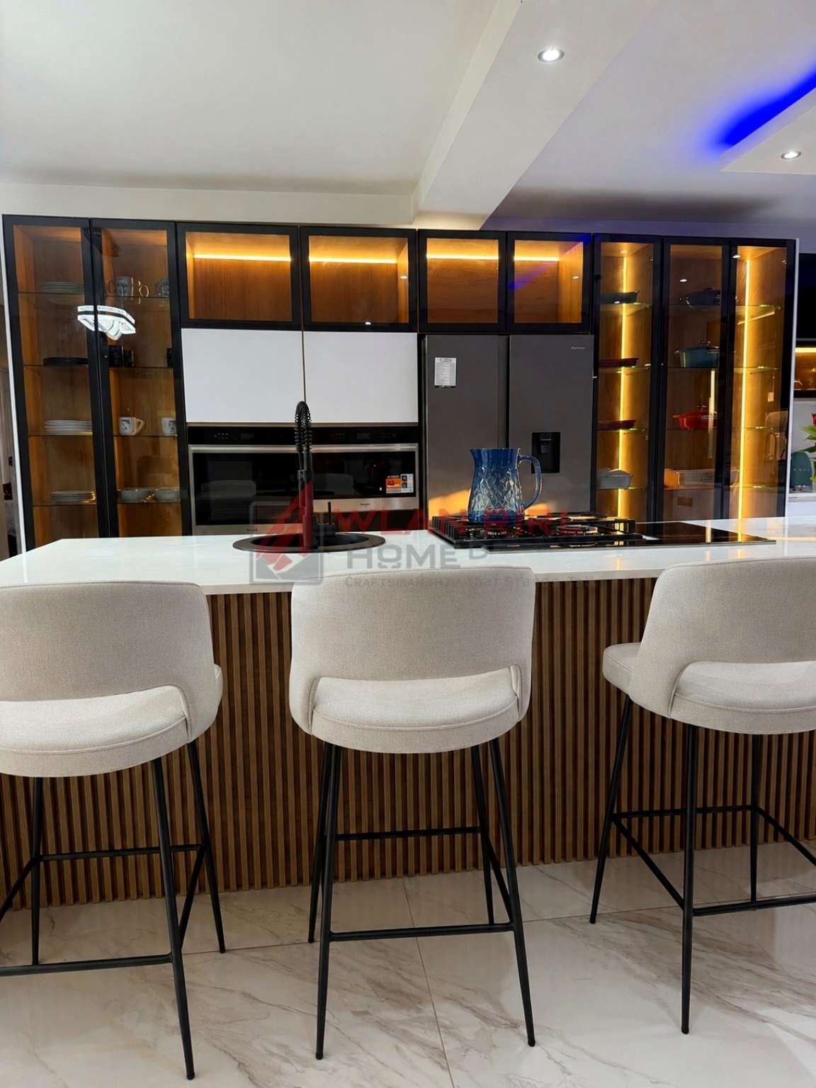 Black frame display cabinets with warm interior lighting
