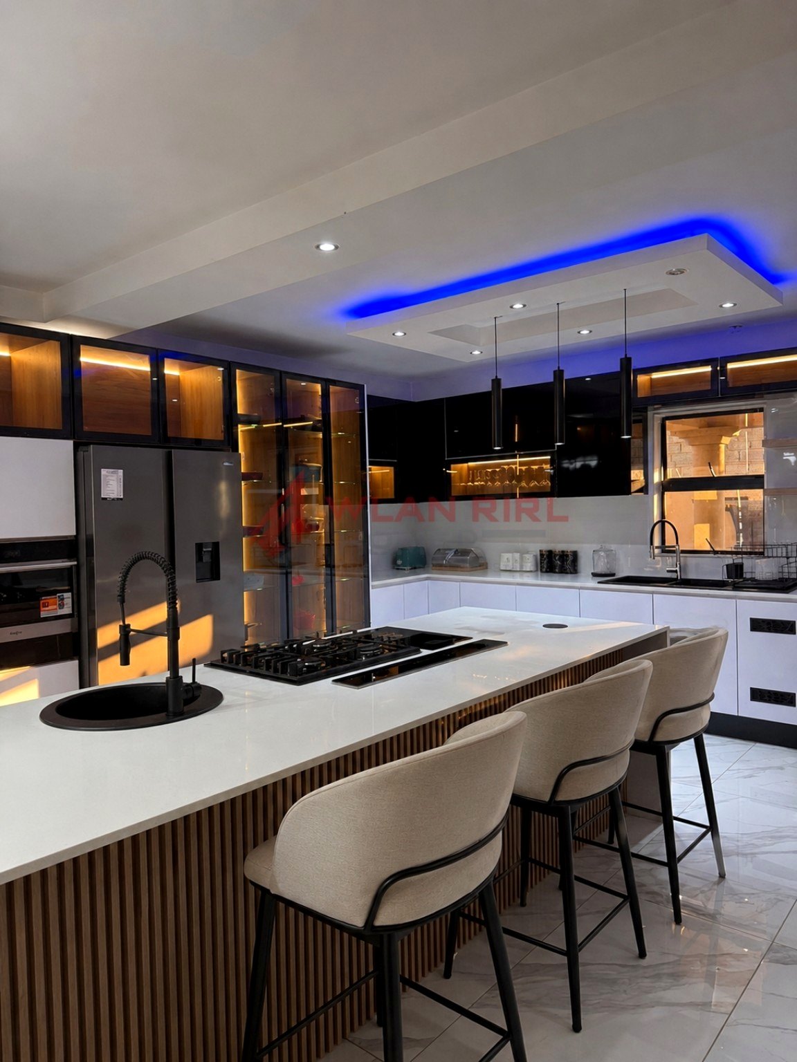 Kitchen island with seating and decorative lighting